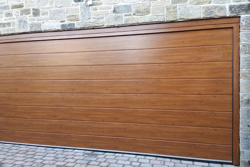oak sectional garage door with wireless remote control